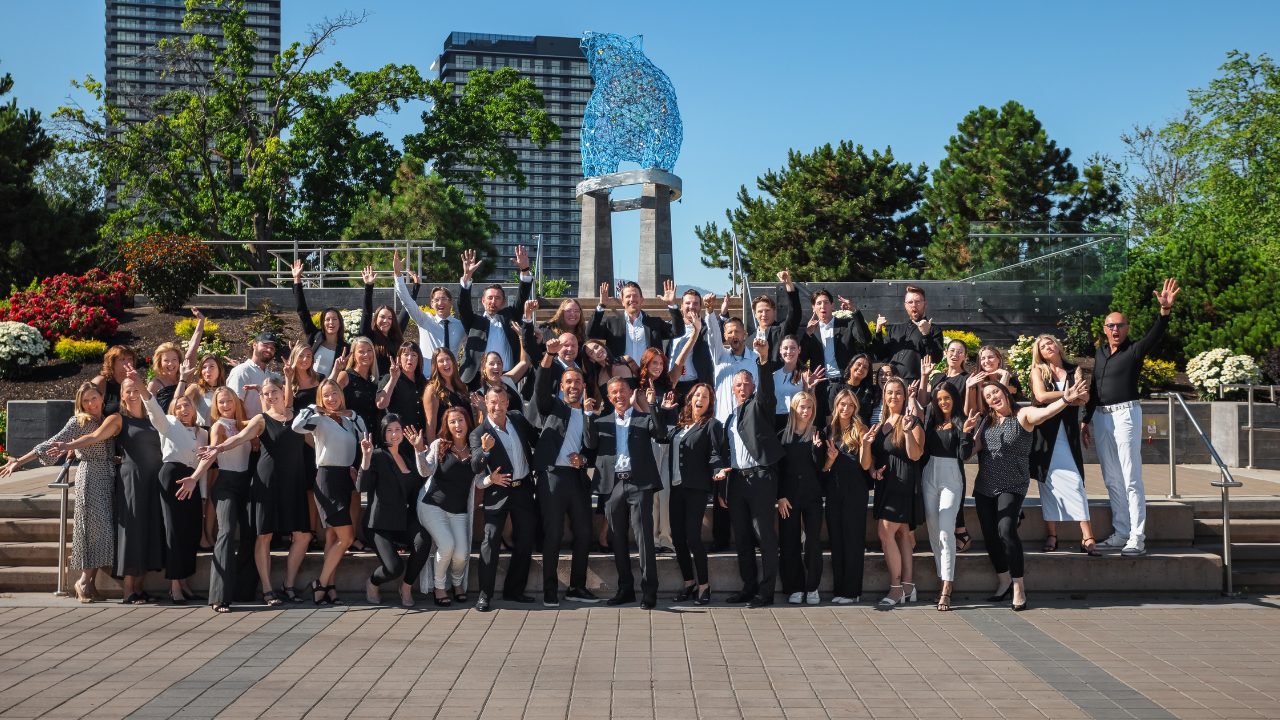 Vantage West Realty team gathered outdoors in Kelowna
